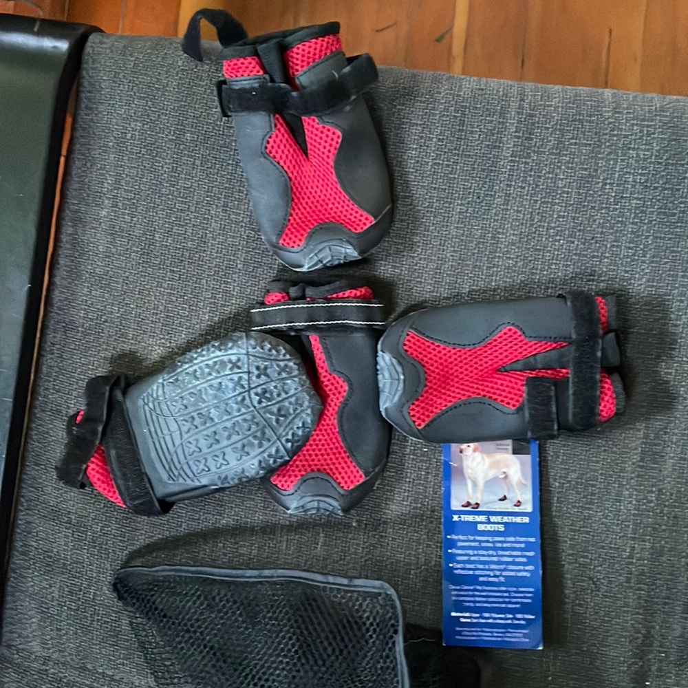 This unused cold weather dog boot measures 4.5 x 3 1/4.